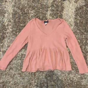 A boutique v-neck sweater light pink shirt.